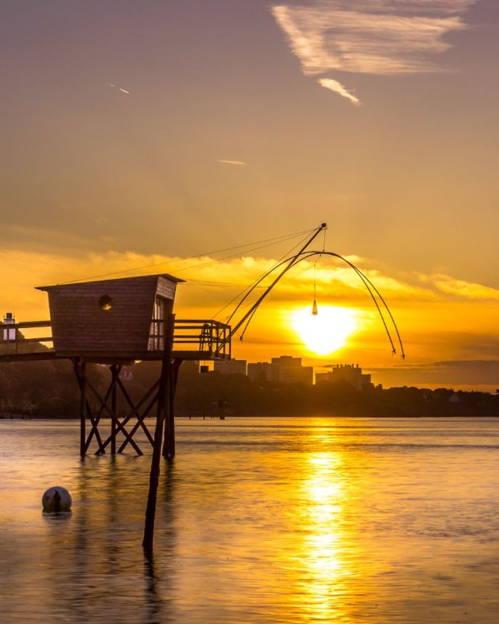 Vue de Saint-Nazaire, couché de soleil depuis la plage